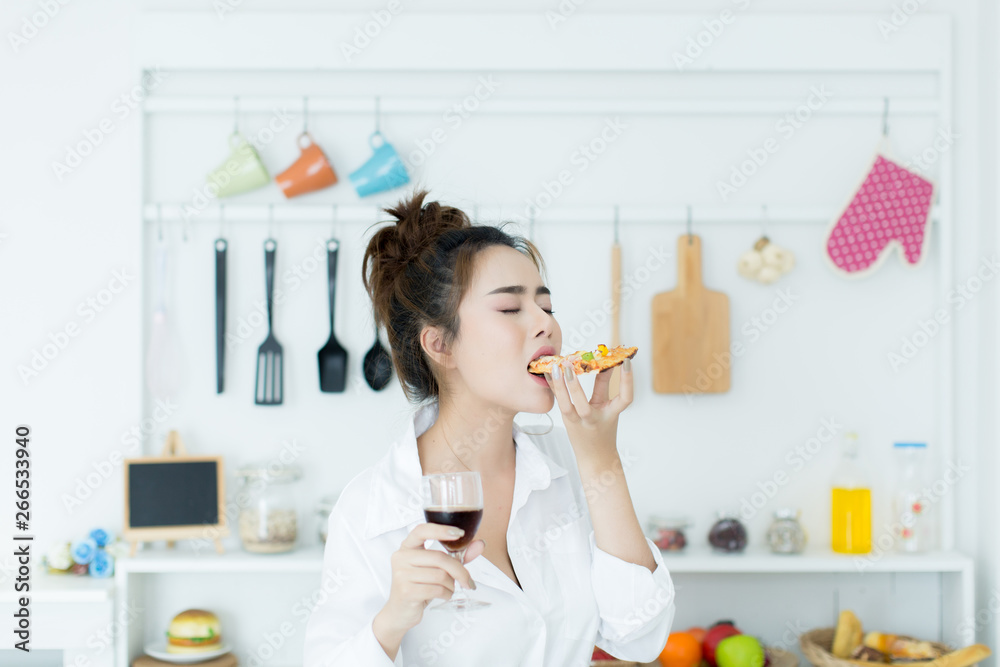 woman enjoying pizza woman enjoying pizza