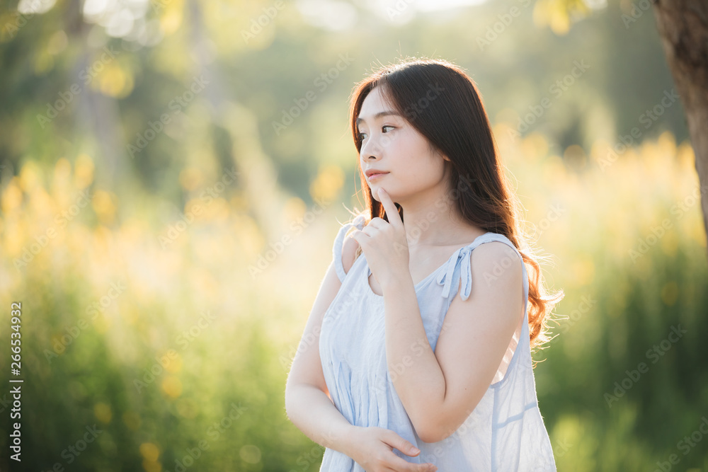 Portrait of Young Asian woman girl smile in flower garden Portrait of Young Asian woman girl smile in flower garden