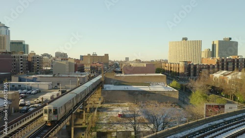Fixed Aerial Shot as CTA Train Arrives at CTA Station [4K]