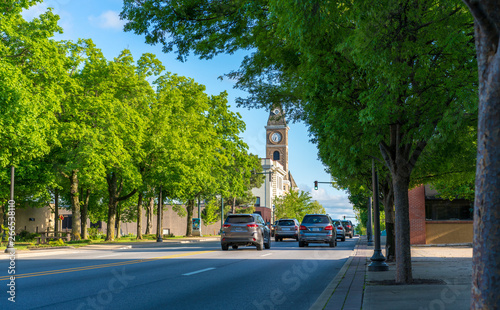 Historic Washington County Courthouse building in Fayetteville Arkansas, college ave, street view traffic, sunny summer day view photo