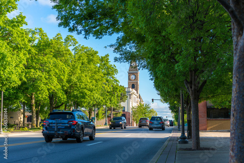 Historic Washington County Courthouse building in Fayetteville Arkansas, college ave, street view traffic, sunny summer day view