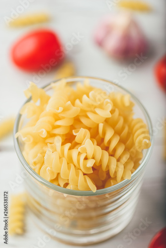 Italian fusilli pasta in glass bowl