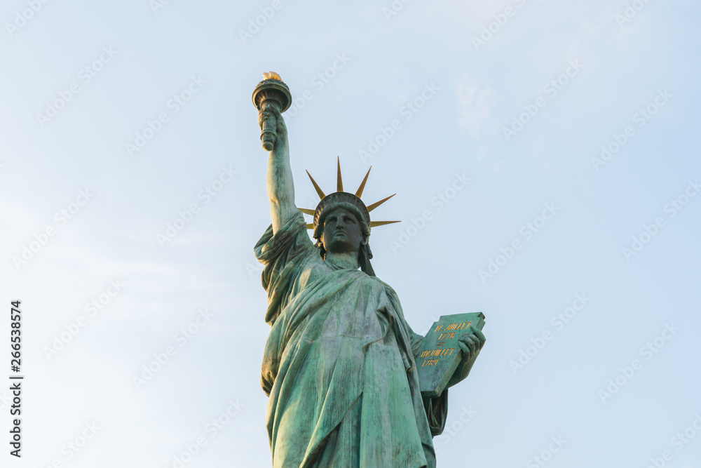 Fototapeta premium Statue of liberty on blue sky background.
