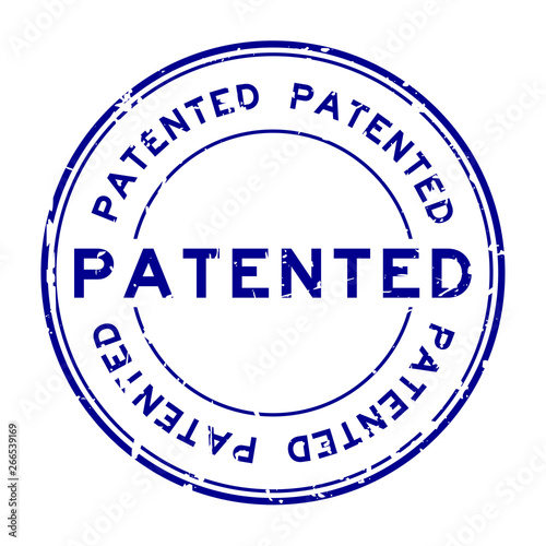 Grunge blue patented word round rubber seal stamp on white background