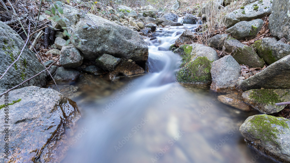 small waterfall in a river near madrid