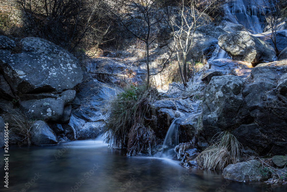 small waterfall in a river near madrid