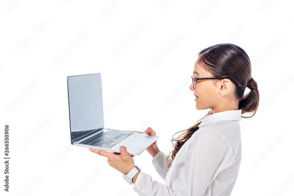 schoolchild holding laptop with blank screen Isolated On White schoolchild holding laptop with blank screen Isolated On White