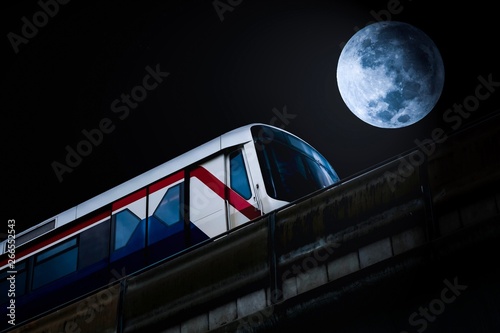 Billede på lærred The city sky train in the full moon night,full moon night background