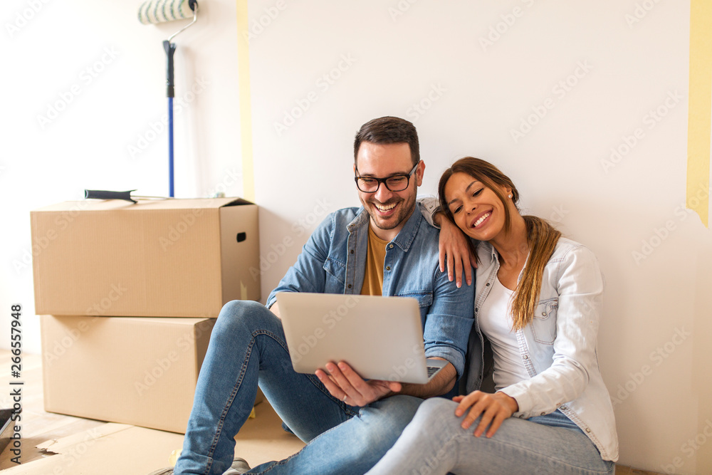 Happy couple moving-in in apartment. Happy couple moving-in in apartment.