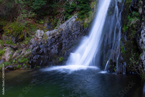 Waterfall in Manteigas, Serra da Estrela in Portugal called Poco do Inferno (Hell Pit)