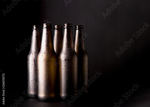 Group of black beer bottles