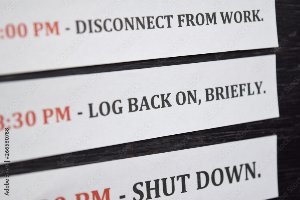 Close up making agenda Daily schedule on personal organizer. Business and entrepreneur concept. Isolated on black background Close up making agenda Daily schedule on personal organizer. Business and entrepreneur concept. Isolated on black background