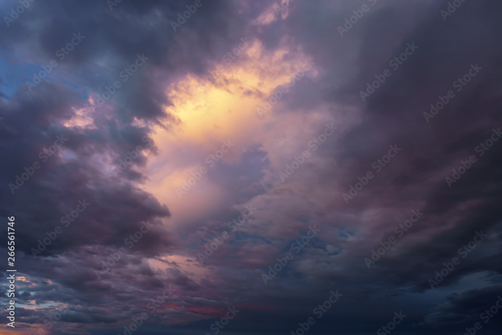 background of cloudy dark sky at sunset