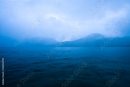 Clouds mist over Caburga lake, southern Chile, Araucania Region, Chile, South America