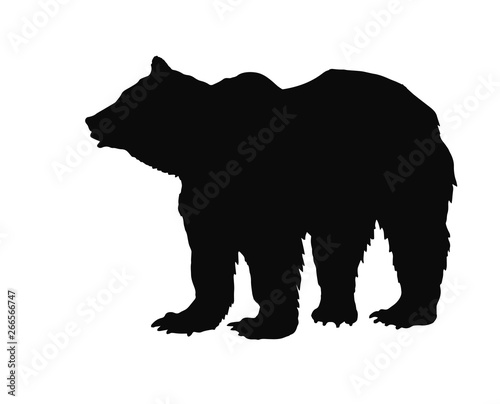 black silhouette of one standing in the grass bear on a white background