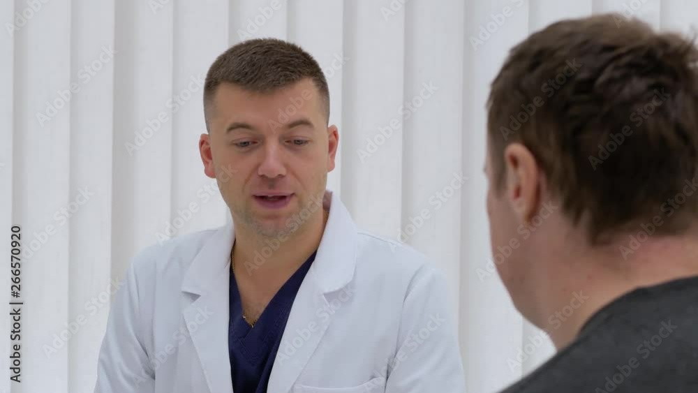 Doctor talking to patient in office. Medicine and healthcare concept. Doctor talking to patient in office. Medicine and healthcare concept.