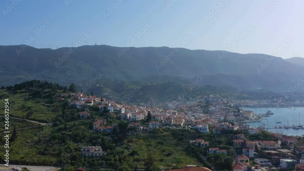 Amazing panoramic view of Porose Greece. Sunny day in Greek island. Aerial video 4K footage. Flyig with birds.