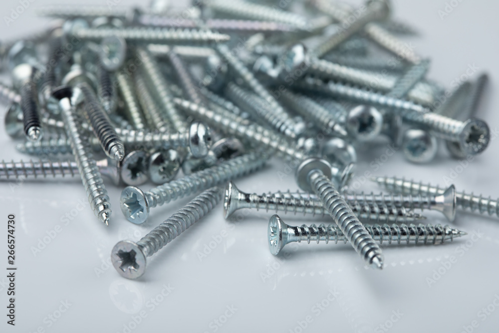 Pile of metal screws, close up
