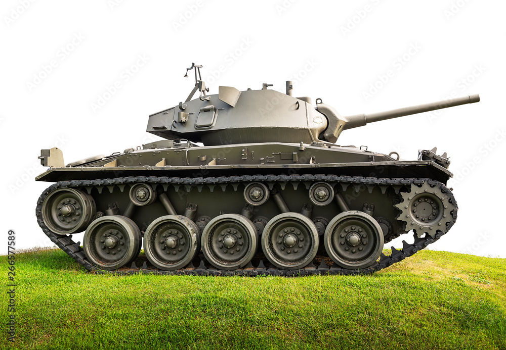 Heavy armor military tank attacking on grassland isolated on white background with clipping path