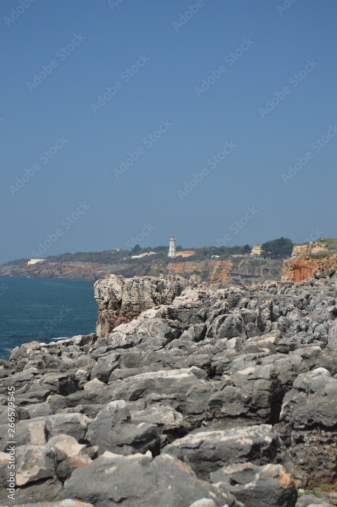 Views Of The Guide Lighthouse From The Mouth Of Hell In Cascais. Photograph of Street, Nature, architecture, history. April 15, 2014. Cascais, Lisbon, Portugal.