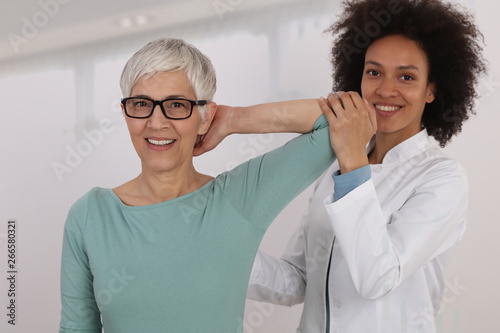Wallpaper Mural Woman having chiropractic back adjustment. Osteopathy, Physiotherapy, Injury rehabilitation concept Torontodigital.ca