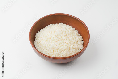 rice in a bowl isolated on white background