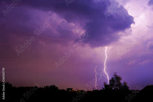 Thunder, lightning and storm in dark night sky
