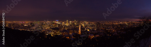 Downtown Montreal city lights at dusk in winter  panorama