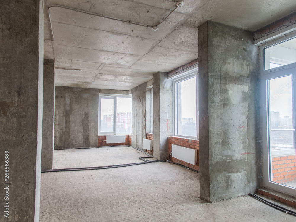 Concrete and brick walls in the apartment for repair