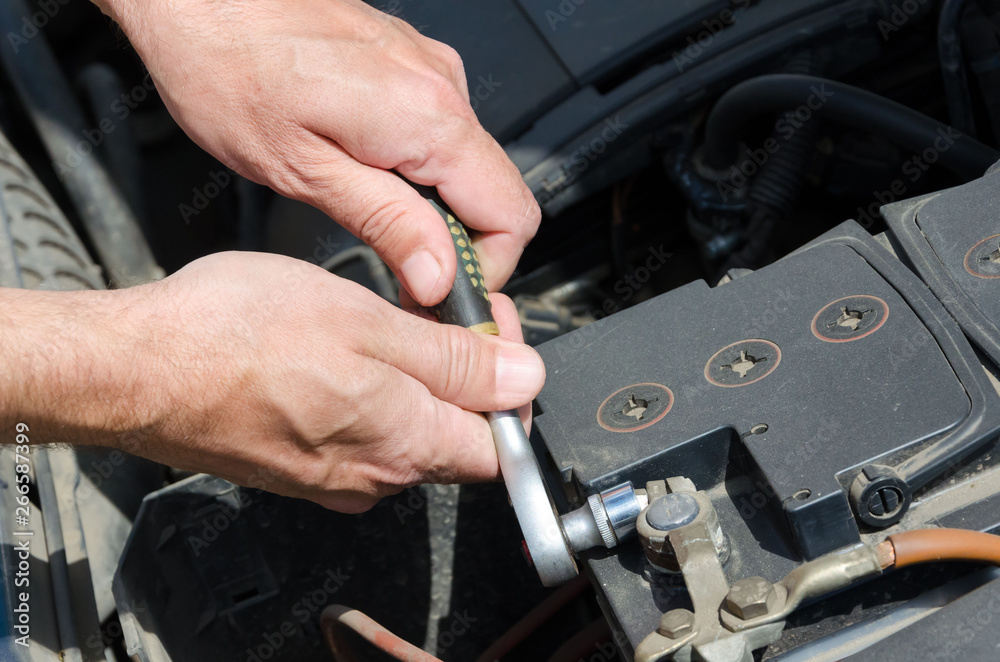 Hand of auto mechanic with a wrench. Hand of auto mechanic with a wrench.
