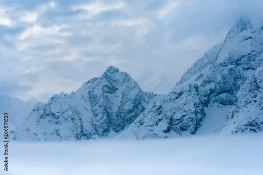 beautiful deep blue panorama of winter landscape with mountains, Dombaj, Russia, copy space