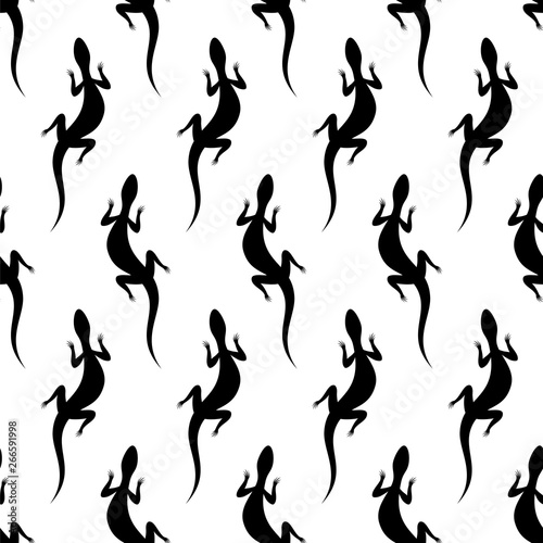 Seamless pattern with silhouettes of lizards. Australian animal. Isolated on white background.
