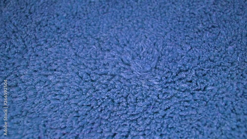 Blue Carpet fabric towel material on rotating plate seamless looping hd background cover video Blue Carpet fabric towel material on rotating plate seamless looping hd background cover video