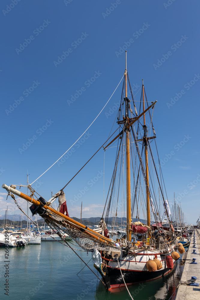 LA SPEZIA, LIGURIA/ITALY - APRIL 19 : Old sailing clipper moored in La Spezia Liguria Italy on April 19, 2019. Four unidentified people LA SPEZIA, LIGURIA/ITALY - APRIL 19 : Old sailing clipper moored in La Spezia Liguria Italy on April 19, 2019. Four unidentified people