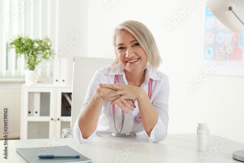 Doctor consulting patient using video chat in clinic, view from web camera