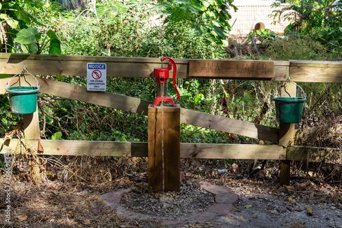 Canal water hand pump for watering horses - Robbins Preserve, Davie, Florida, USA photo