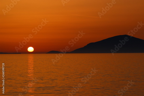 Amazing summer sunset taken on the beach on the greek island Kos.