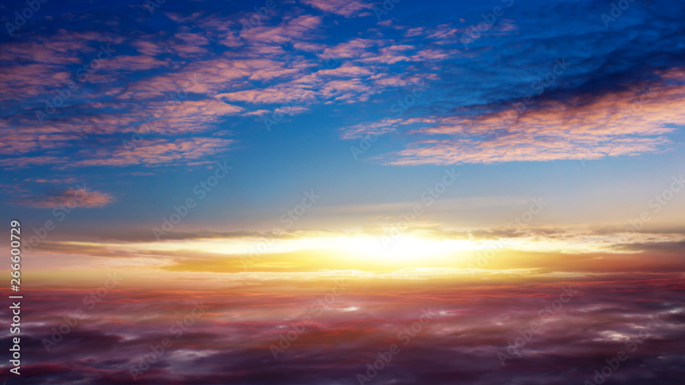Beautiful sunset .  Beautiful heavenly landscape with the sun in the clouds . View of clouds from high altitude . Paradise heaven .light about the sky .
