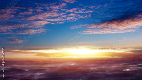 Beautiful sunset . Beautiful heavenly landscape with the sun in the clouds . View of clouds from high altitude . Paradise heaven .light about the sky . © yaalan