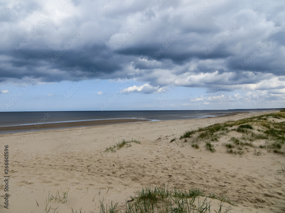 Beautiful view of the Gulf of Riga in early spring, in anticipation of thunderstorms. Beautiful view of the Gulf of Riga in early spring, in anticipation of thunderstorms.
