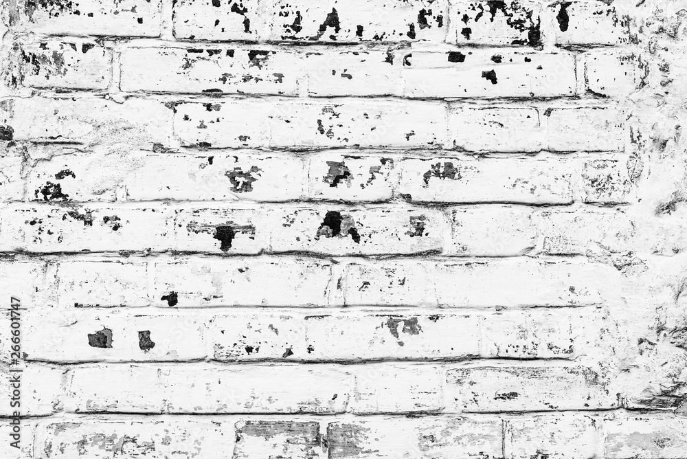 Fototapeta premium Brick texture with scratches and cracks