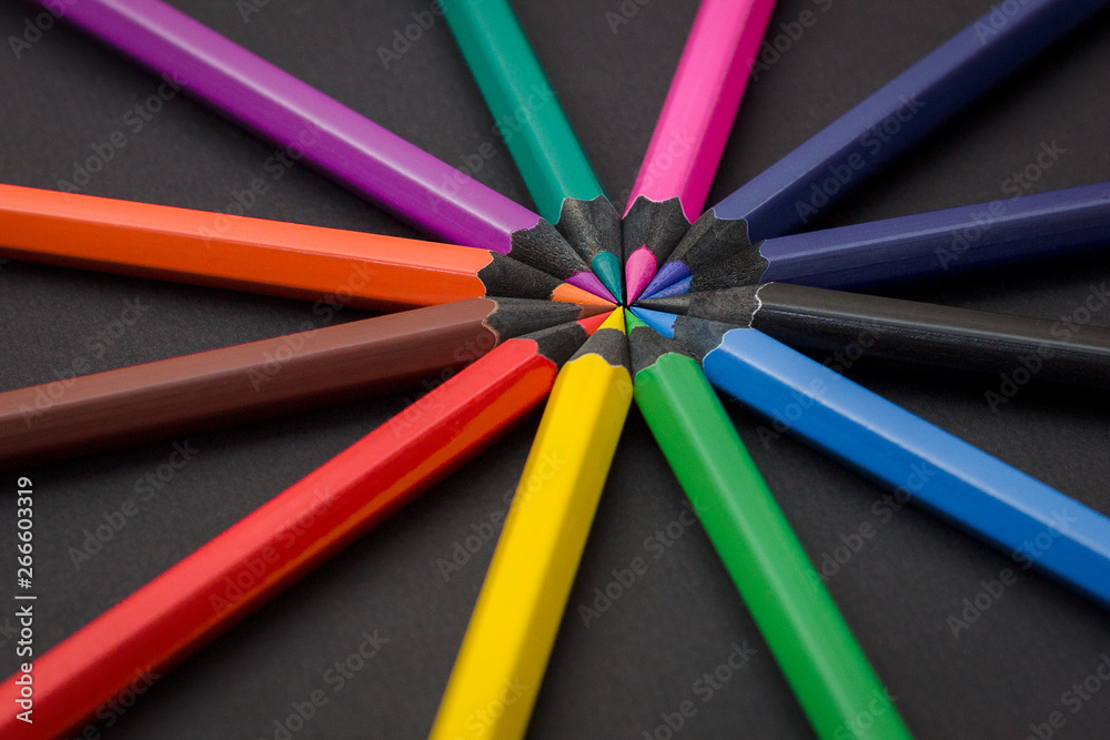 colored pencils on black background colored pencils on black background