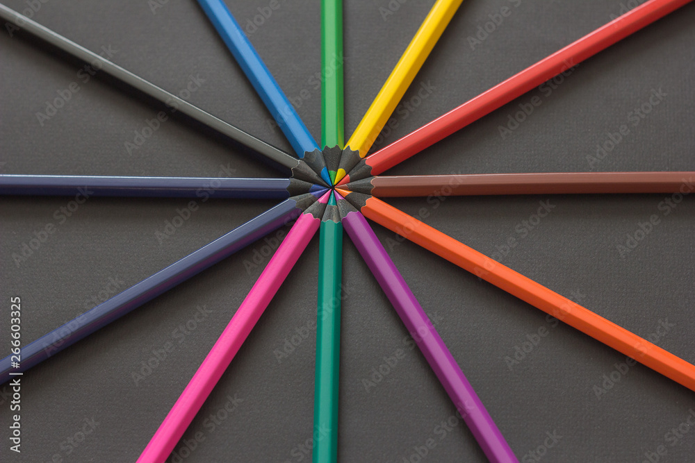 Fototapeta premium colored pencils on black background