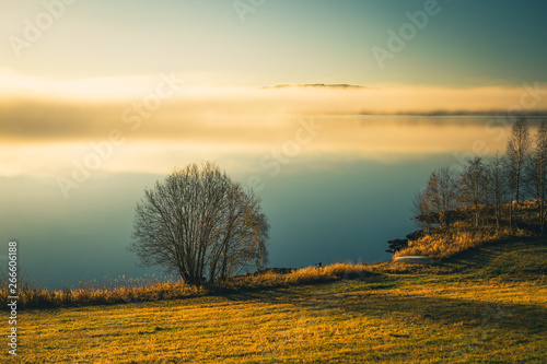 Foggy autumnal surise at Jonsvatnet, Norway