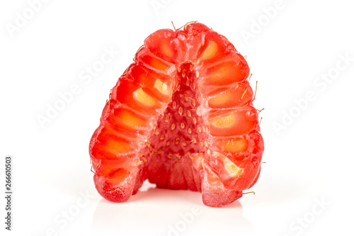One half of fresh red raspberry cross section isolated on white background