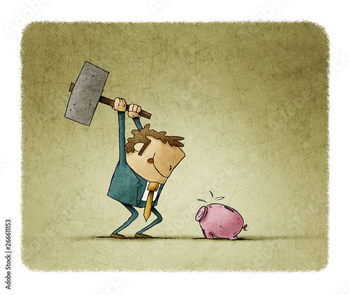 Businessman with a hammer in his hand is going to break a piggy bank and take...