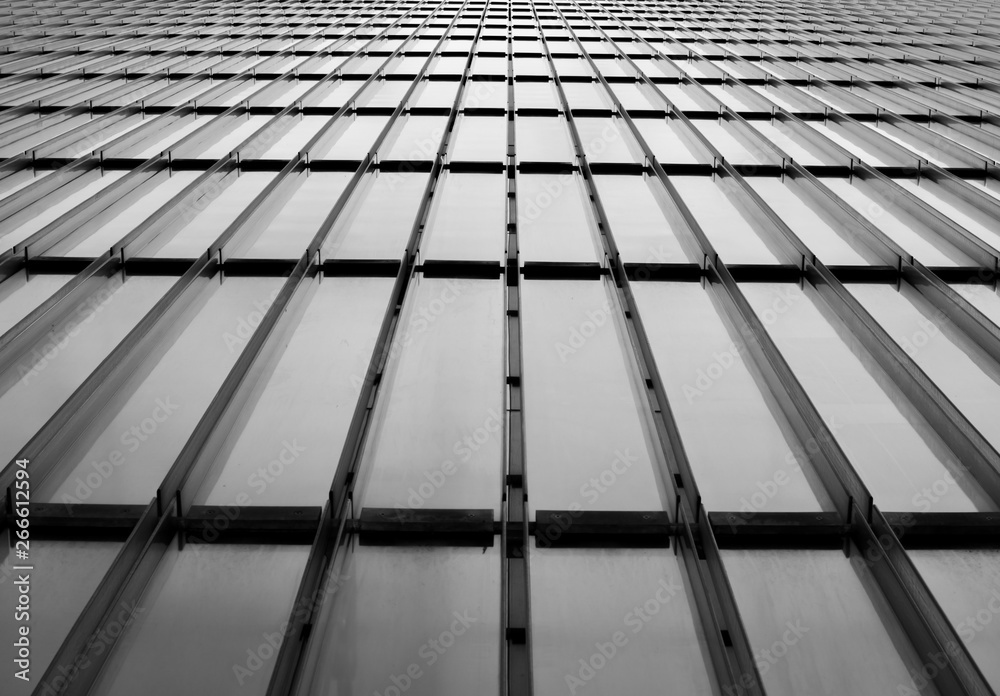 Glass and metal wall with diagonal lines and perspective background. black and white Glass and metal wall with diagonal lines and perspective background. black and white