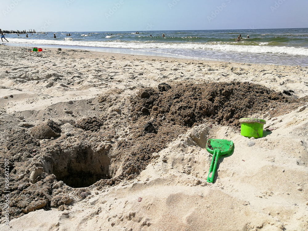 Plastic toy tools for digging sand on the beach Plastic toy tools for digging sand on the beach