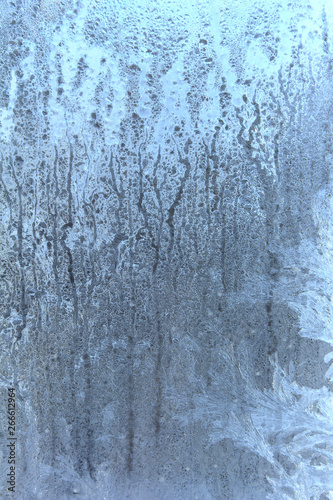 Frost on the glass. The frozen water. Winter background © kluva