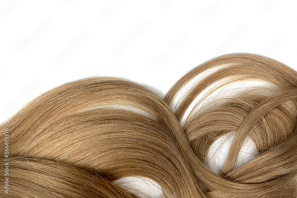 Natural brown hair isolated on white. Background Natural brown hair isolated on white. Background